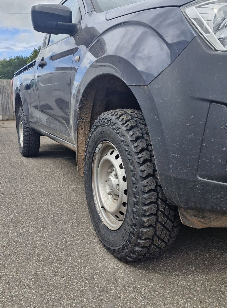 A pickup on fresh all-terrain tyres